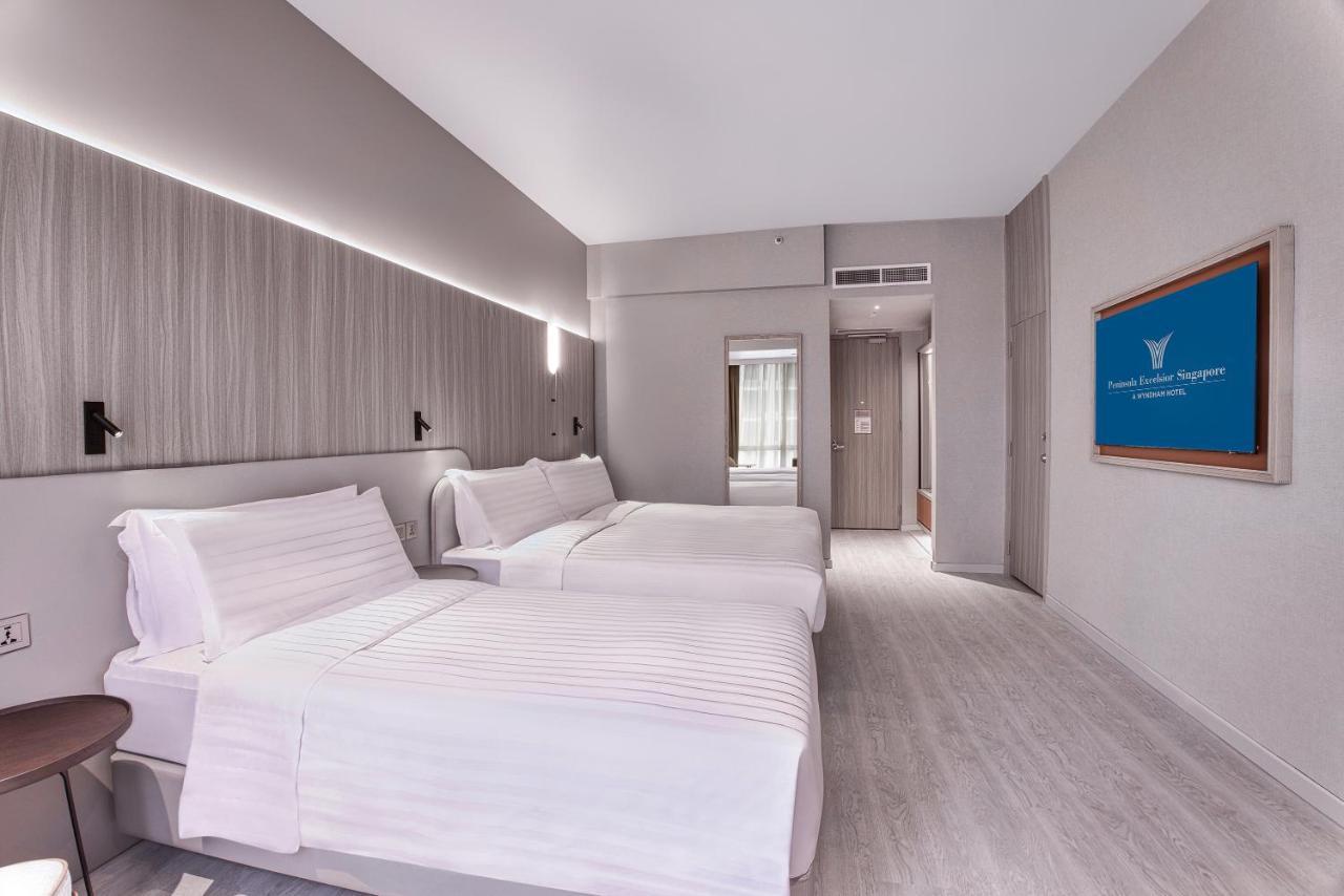 Wyndham Singapore Hotel Экстерьер фото A room at the hotel